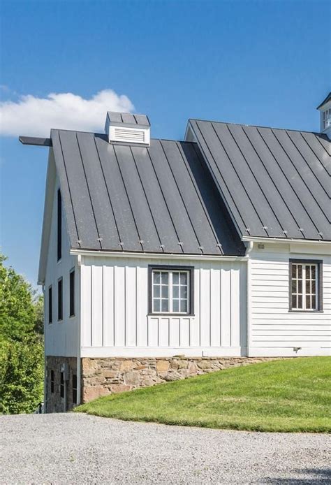 white house with galvanized metal roof|houses with charcoal metal roof.